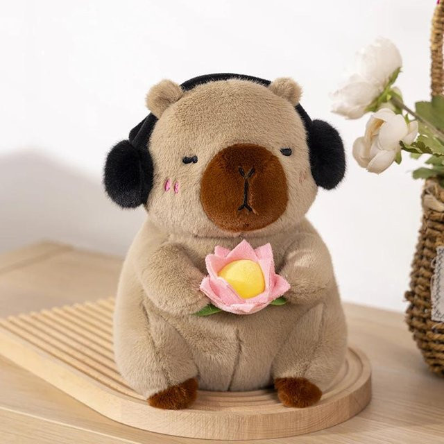 Yiran Health & Beauty Capybara Plüschtier, hält Lotusblume, 38cm - Bild 1