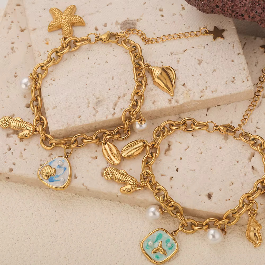 Jolivie Edelstahl-Armband, vergoldet, Seestern-Muschel-Anhänger, Damen - Bild 2