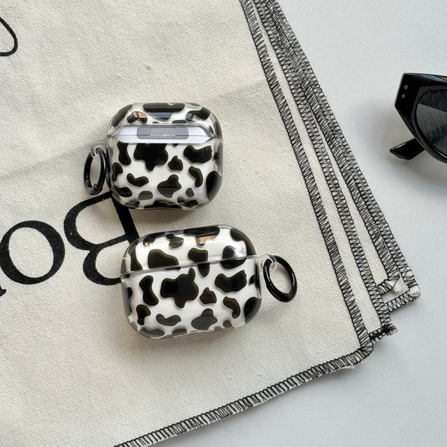 Transparente Kopfhörerhülle mit Kuh-Textur und schwarzem Leopardenmuster für Apple AirPods 1, 2, 3, 4 sowie Pro 2 und Pro 3 - Bild 1