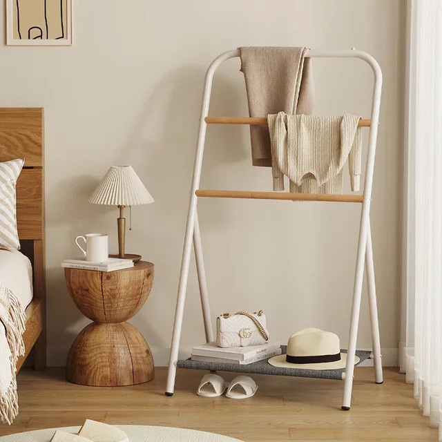 LIUSHADUOLA Kleiderständer aus Metall für Schlafzimmer und Wohnzimmer, minimalistisches Kleiderregal in Schwarz oder Weiß mit mattem Finish - Bild 1