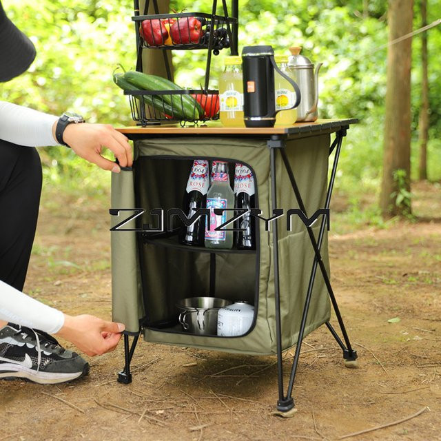 ZJMZYM Outdoor-Campingtisch in Grün mit doppellagiger Ablage und Stauraum, faltbarer Grill- und Kochtisch aus Metall und Holz für Picknick und Wandern - Bild 1