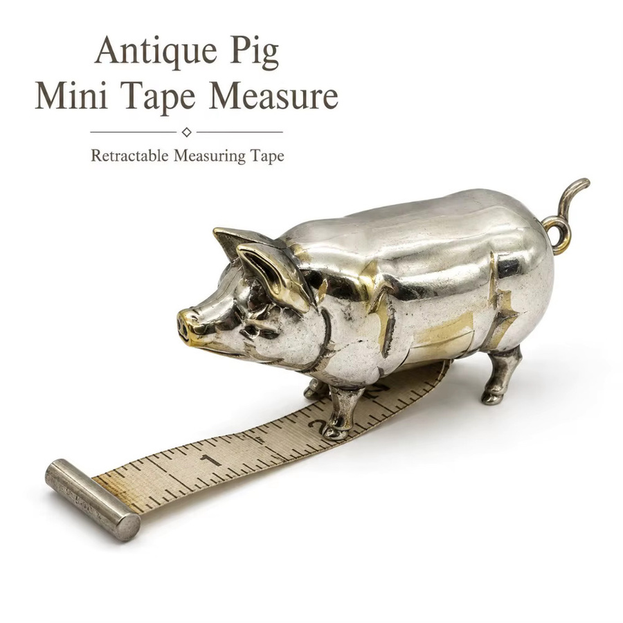 Tragbares Mini-Maßband in Schweinchenform aus Metall in Silber für Handarbeiten und Schneiderarbeiten - Bild 2