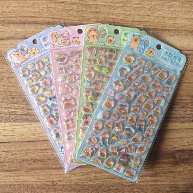 4er-Set 3D-geprägte Capybara-Aufkleber von AnimeWorlds Store in Multicolor zur Dekoration von Notizbüchern und Geräten - Bild 1