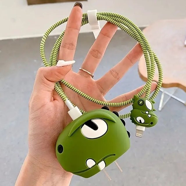 Schutzabdeckung mit Dinosaurier-Design für iPhone Ladegeräte und Datenkabel in Pink oder Grün - Bild 1