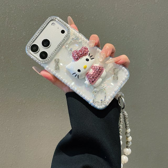 Sanrio Hello Kitty Handyhülle mit 3D Cartoon Design, Bling Glitzer und Perlen, stoßfeste Hartschale für Apple iPhone 17 16 15 14 13 12 11 Pro Max - Bild 1
