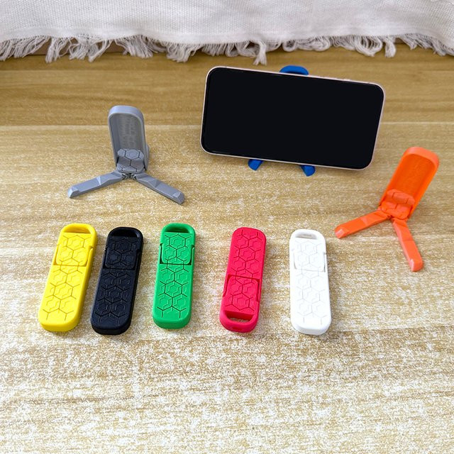 Tragbarer faltbarer Handyständer im 3D-Druck Design für universelle Mobiltelefone in Gelb - Bild 1