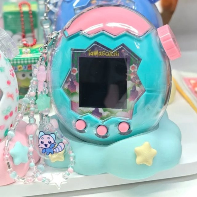Bandai Tamagotchi Paradise Emerald Forest Edition, Elektronisches Haustierspielgerät - Bild 1