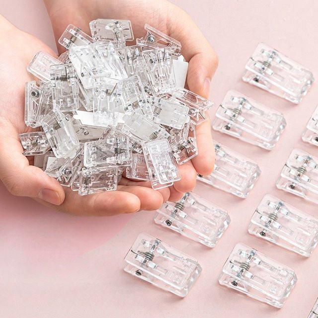 20 Stück selbstklebende Wandklammern aus transparentem Kunststoff für Poster und Fotos - Bild 1