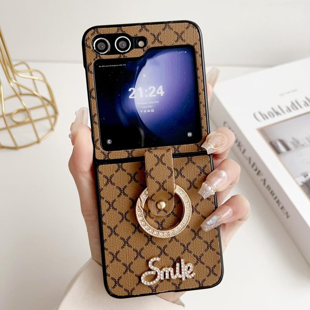 Handyhülle mit Handschlaufe und Lächeln-Design aus Kunstleder für Samsung Galaxy Z Flip 5, Z Flip 4 und Z Flip 3 5G in Schwarz - Bild 1