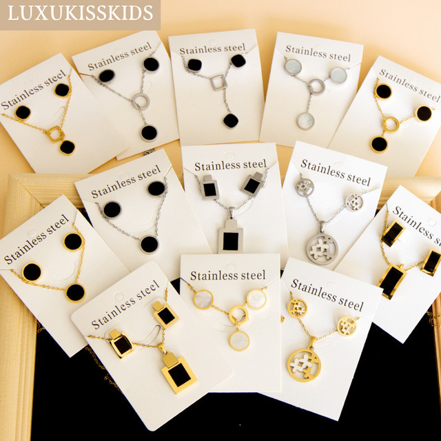 LUXUKISSKIDS Schmuck-Set Edelstahl, schwarz weiß, Muschel, Damen - Bild 1