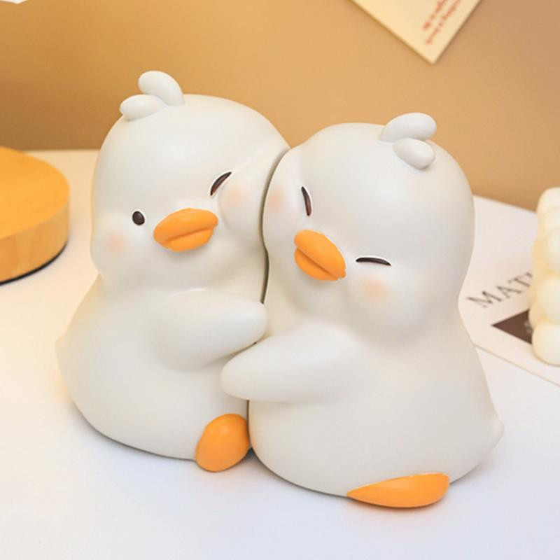 Set aus 2 süßen Enten Buchstützen aus Harz als dekorative Tierfiguren für deinen Schreibtisch oder dein Wohnzimmer - Bild 2