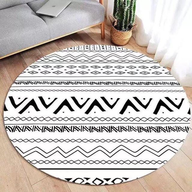 Runde Teppichmatte Lodestar mit geometrischem Ethno-Stammesmuster in Schwarz, Weiß und Bunt, weiche Bodenmatte aus Polyester, Durchmesser: 40 cm - Bild 1