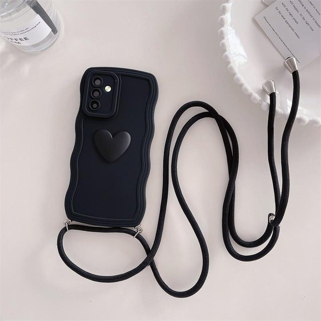 Silikonhülle mit lockigem Crossbody Lanyard und 3D Love Heart Design für Samsung Galaxy S24 S23 S22 S21 Ultra S23 FE A54 A34 A14 A15 A25 A35 A55 A05 sowie iPhone X XS in Schwarz - Bild 1
