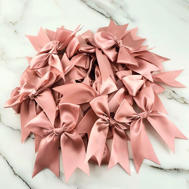 30 Stück Rosa Satin-Schleifen aus Polyester für DIY-Handwerk und Dekoration von RIBBON HOUSE - Bild 1