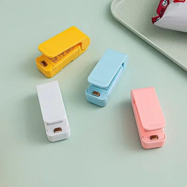 Mini-Heißsiegelgerät in Pink als tragbarer Versiegler für Plastik-Lebensmittelbeutel - Bild 1