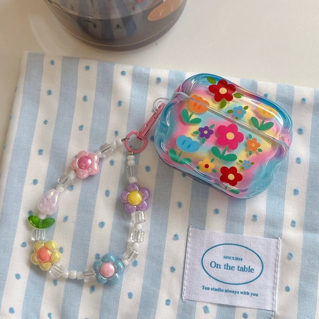 Apple AirPods Schutzhülle mit buntem Blumendruck und Perlenanhänger, Multicolor - Bild 1