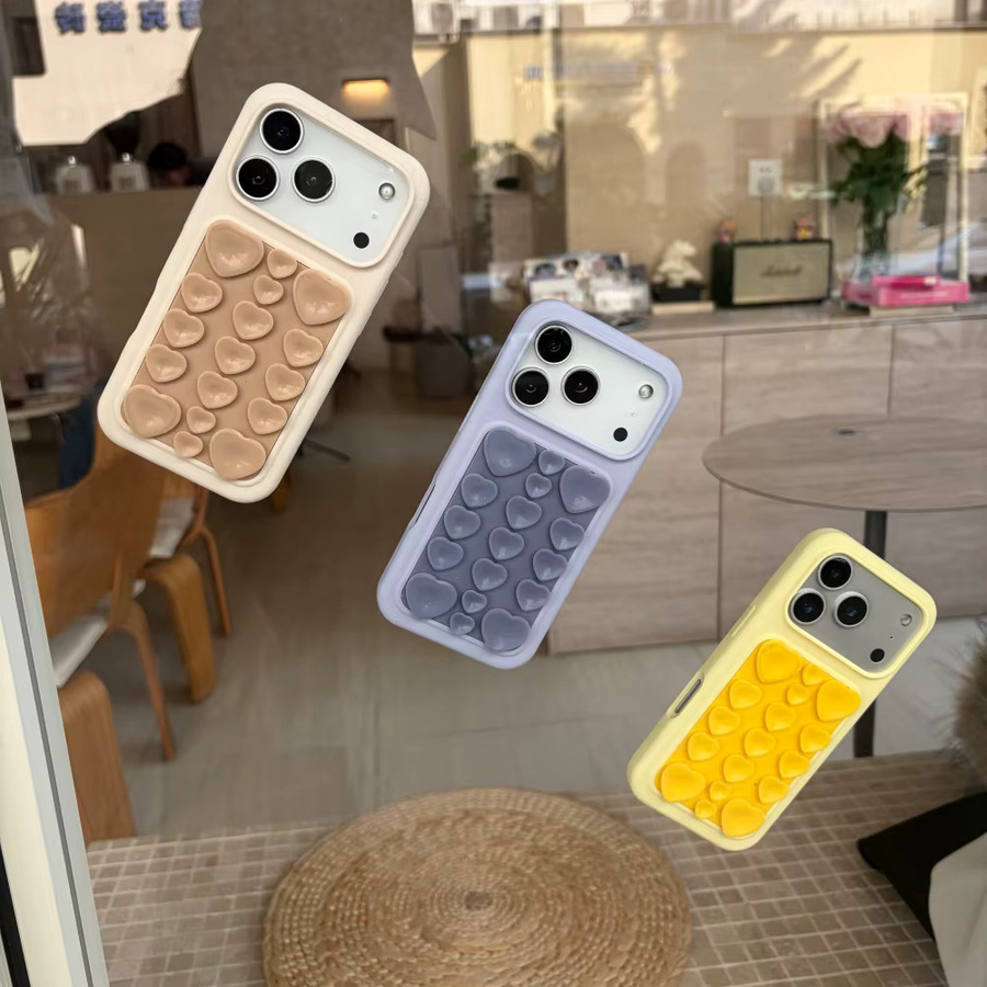Xeber Silikonhülle mit 3D-Herz-Design und starker Saugnapf-Adsorption für iPhone 17 Pro und 16 Pro Max, Gelb, stoßfest und weich - Bild 1