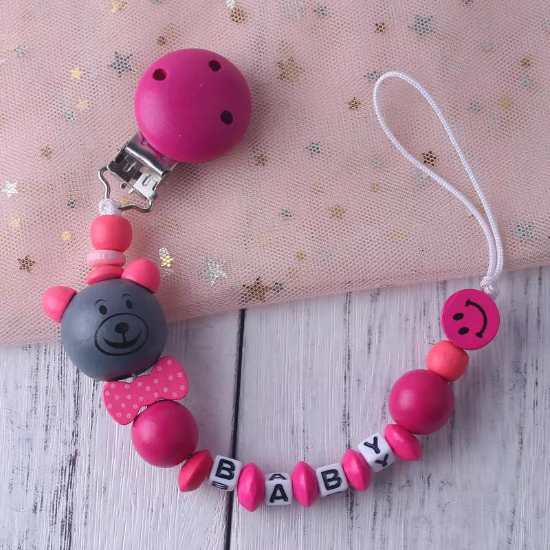 Panplay Set mit 5 niedlichen Cartoon-Baby-Schnullerclips in verschiedenen Farben mit Holz-Beißperlen für Jungen und Mädchen - Bild 1