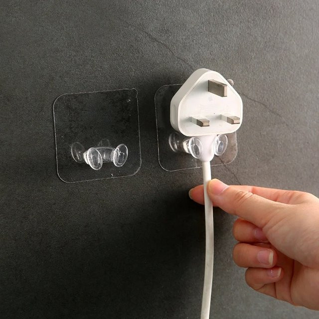 Transparente Wandhaken aus PVC für Steckdosen und Kabel zur ordentlichen Aufbewahrung in Küche und Bad - Bild 1