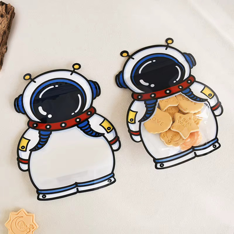 10 Stück ZQNYCY Astronaut Snack Verpackungstaschen aus Kunststoff für Kinder Weltraum Geburtstag Party Dekoration in Mehrfarbig - Bild 3