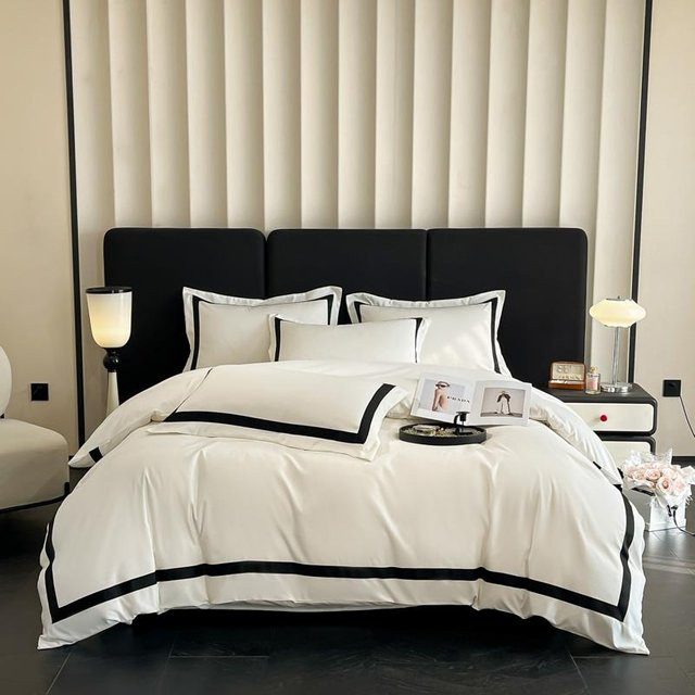 Vierteiliges Bettwäsche-Set von Bin Chi Textiles in Weiß, bestehend aus Bettbezug, Kissenbezügen und Spannbettlaken, Maße: 200 x 230 cm - Bild 1