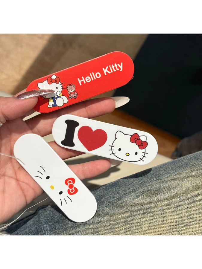 Sanrio Hello Kitty Handyhalterung im Pflaster-Design als universeller Push-Pull-Ständer für dein Smartphone - Bild 4