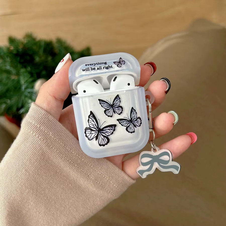 Schutzhülle mit Herzform und Schmetterlings-Print für Apple AirPods 1/2/3/4 und AirPods Pro inklusive Schlüsselanhänger in Weiß und Transparent - Bild 2