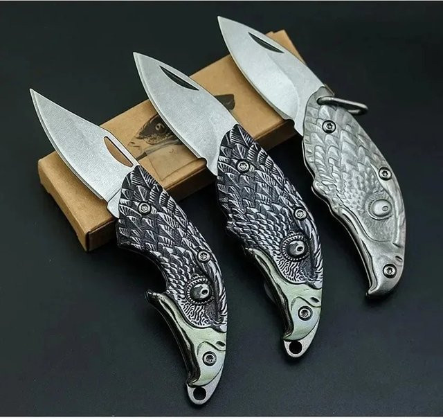 Kreatives Mini-Klappmesser mit Adlerkopf aus Edelstahl in Silber als EDC-Schlüsselanhänger für Outdoor-Einsätze - Bild 1