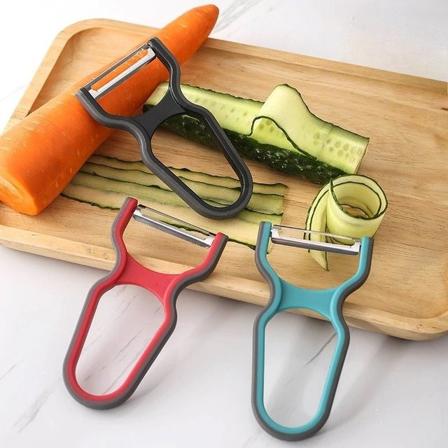 PDQ Edelstahlschäler in Silber mit drehbarer Klinge und ergonomischem Griff für Gemüse und Obst - Bild 1