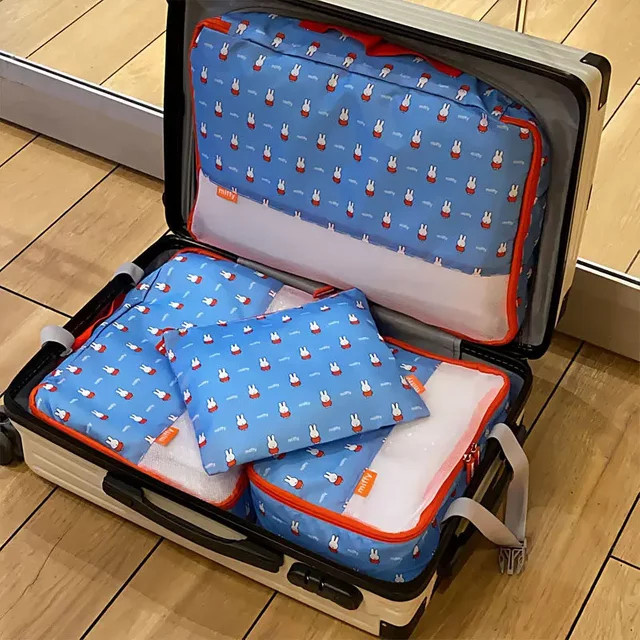 Miffy Vierteiliges Set Niedrige Aufbewahrungstaschen für Reise und Business in Blau mit Mesh-Einsatz - Bild 1