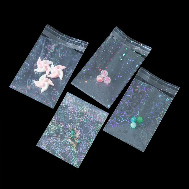 50 Stück bunte holografische Laser-Schmuckbeutel aus Kunststoff von YouYoungDifferent zur Aufbewahrung von Halsketten und Armbändern sowie als Geschenkverpackung - Bild 1
