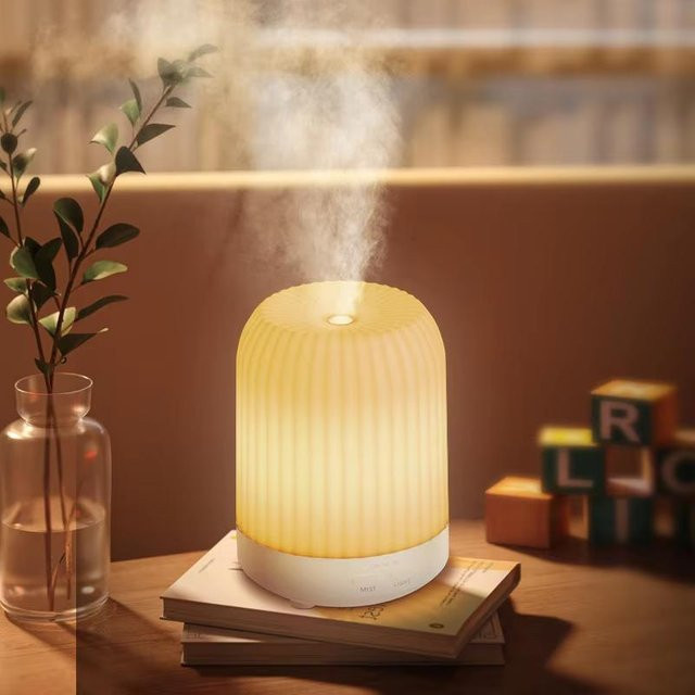 Automatischer Aromatherapie Diffusor mit Nachtlicht und Luftbefeuchter für dein Schlafzimmer - Bild 1