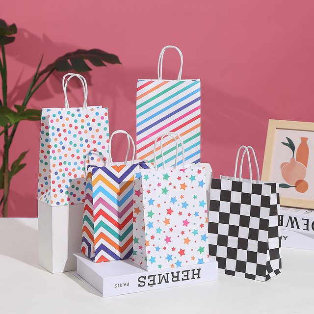20 Stück bunte Papier-Geschenktüten mit Griff für Kindergeburtstage und Hochzeiten in Mehrfarbig - Bild 1
