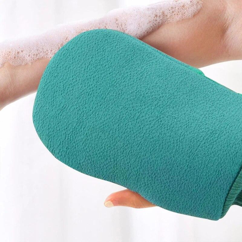 Rosa Peeling-Handschuh für die Körperreinigung und Massage in der Dusche oder im SPA - Bild 1
