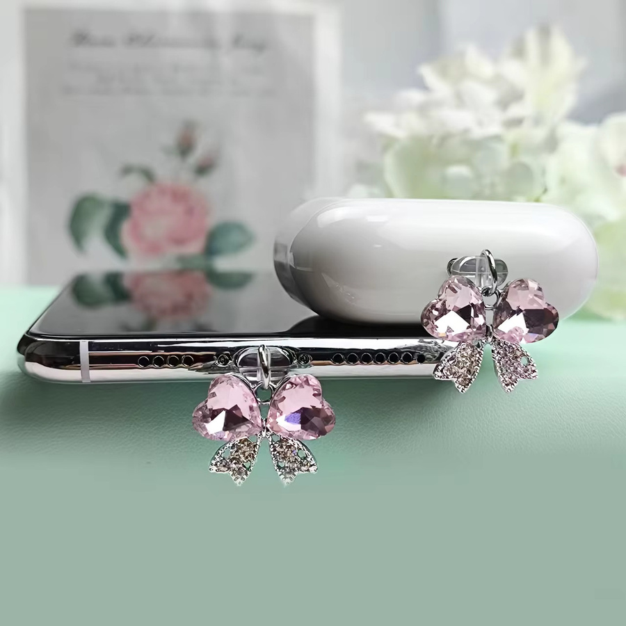 Strass-Schmetterling Staubschutz für iPhone und USB-C in Pink - Bild 2