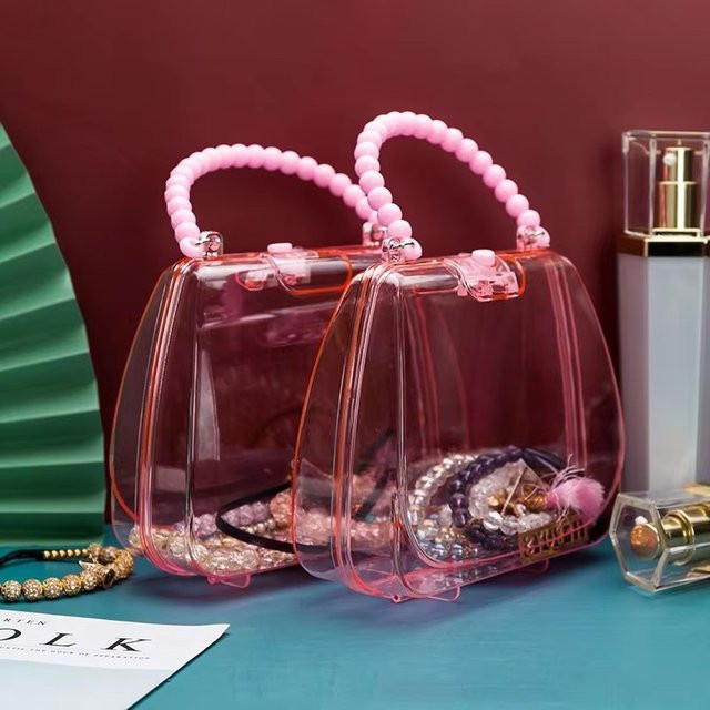 Transparente Schmucktasche für Kinder aus Kunststoff zur Organisation von Stirnbändern, Ohrringen und Armbändern - Bild 1