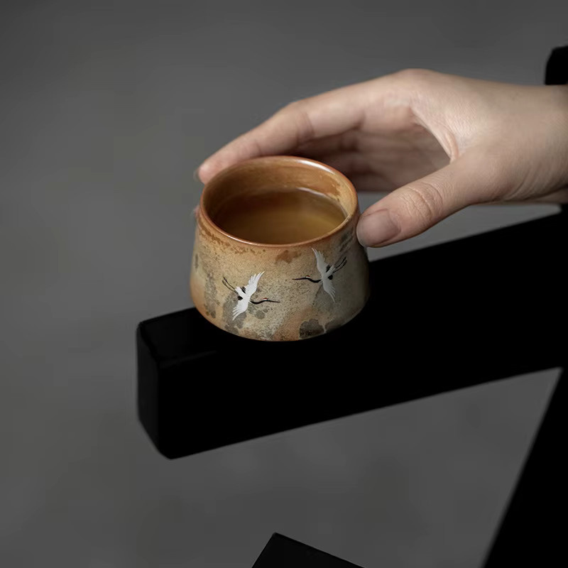 Elegante Jianzhan Teetasse aus Porzellan mit Porzellankranich-Motiv in Braun - Bild 4