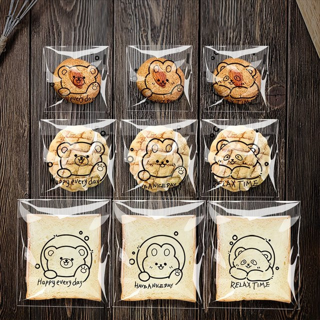 100 Stück transparente 3-in-1 Cartoon-Backbeutel aus Kunststoff für Brot, Kekse und Gebäck - Bild 1