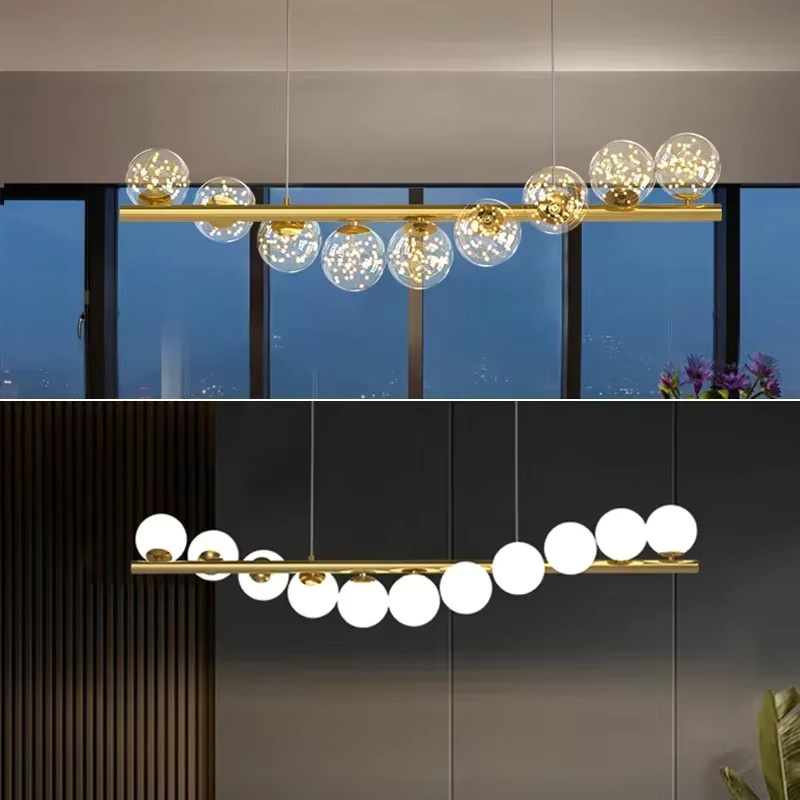 TAONUANSHU Modern Nordic Kronleuchter aus Metall und Glas in Gold/Messing mit transparenten Glaselementen für Wohnzimmer, Küche oder Büro - Bild 1