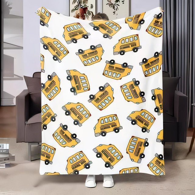 Weiche Plüschdecke für Kinder mit gelbem Schulbus-Motiv in Gelb und Weiß - Bild 1