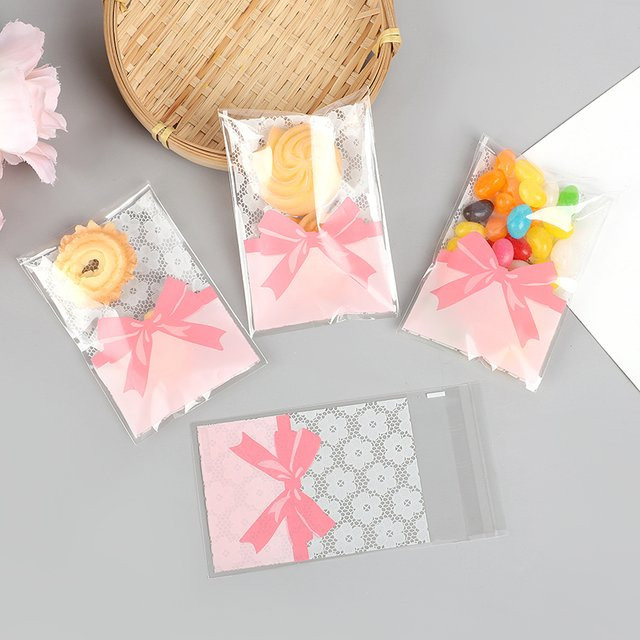 50 Stück Selbstklebende Blumen-Spitzen-Geschenktüten aus Kunststoff für Hochzeit, Geburtstag und Party, B: 7 cm, H: 10 cm - Bild 1