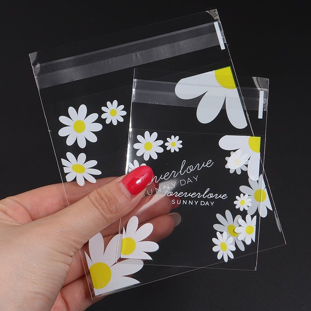 100 Stück transparente Geschenktüten mit Gänseblümchen-Aufdruck, selbstklebende Kunststoff-Verpackungstüten für Hochzeit, Geburtstag und Party - Bild 1
