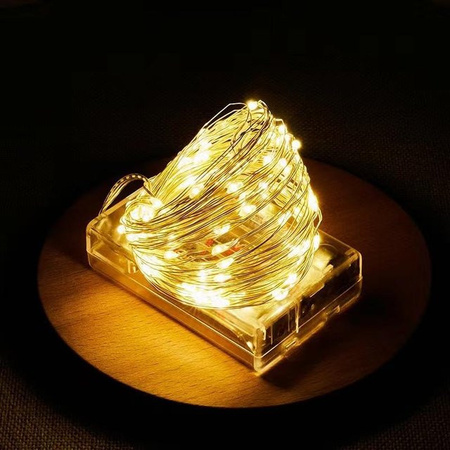 Yongkomo LED-Lichterkette mit 100 LEDs in Warmweiß, 10m Länge, batteriebetrieben für Weihnachten und Hochzeitsdekor