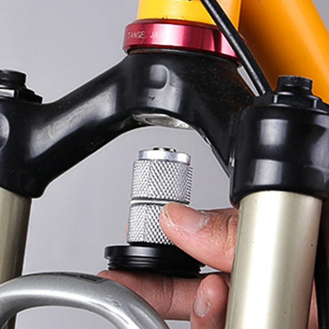 Apple AirTag Fahrradhalterung für Gabel und Unterrohr zur Diebstahlsicherung als Tracker-Halterung und Headset-Kappe Abdeckung - Bild 1