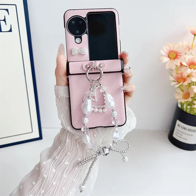 Schutzhülle mit Lederarmband, Perlen und Schmetterlings-Design für Oppo Find N3, Find N3 Flip, Find N2 Flip und Find N2 Flip 5G in Gelb - Bild 1