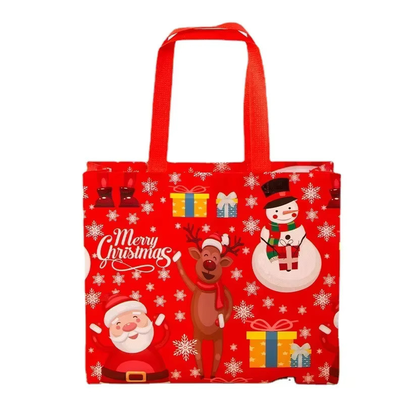 Weihnachtsgeschenktüten aus Vliesstoff mit laminiertem Griff in Blau und Rot, B/H: 32 x 10 cm - Bild 2