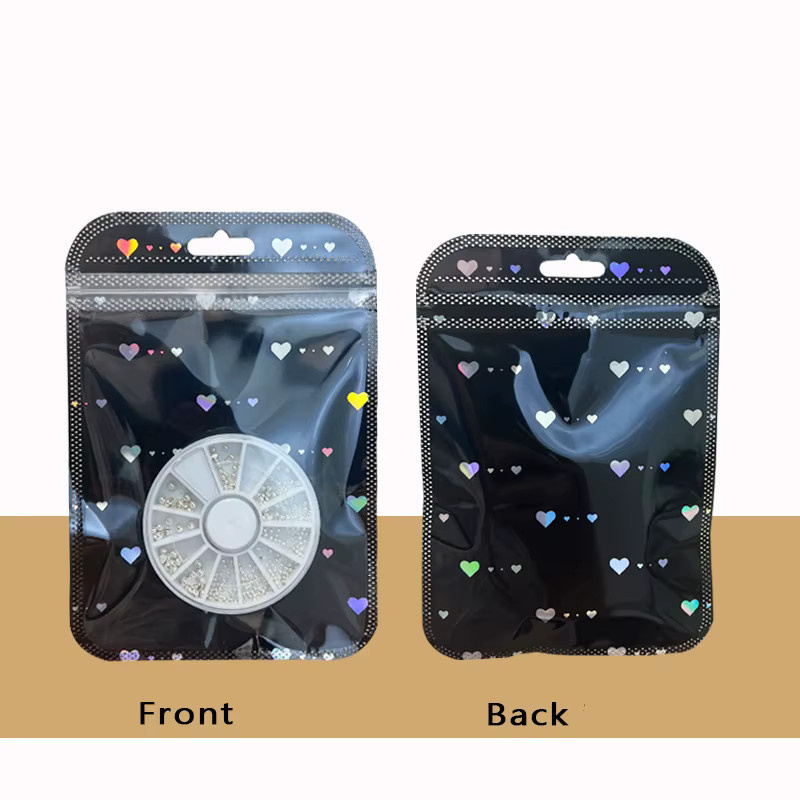 50 Stück wiederverschließbare Mylar-Beutel mit Schwarz-Weiß-Laserherz-Design und Reißverschluss zur Lebensmittelaufbewahrung und Verpackung, Schwarz-Weiß - Bild 2