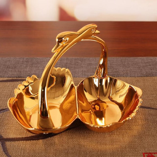 Elegantes Snacktablett in Vogelform als Obstteller und Tischdekoration, Farbe: Braun und Gold - Bild 1
