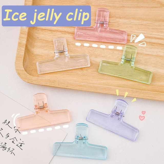 Kreativer transparenter Foldback Clip aus Kunststoff für Büro und Schule in Weiß - Bild 1