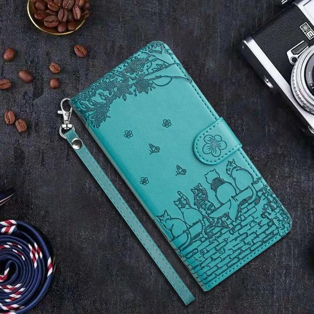 Rui Di Lederhülle mit Katzenprägung und Kartenfach als magnetisches Portemonnaie für iPhone Modelle in Blau und Türkis - Bild 1